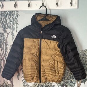 The North Face Kids' reversible Black and Brown Puffer Jacket, size extra small